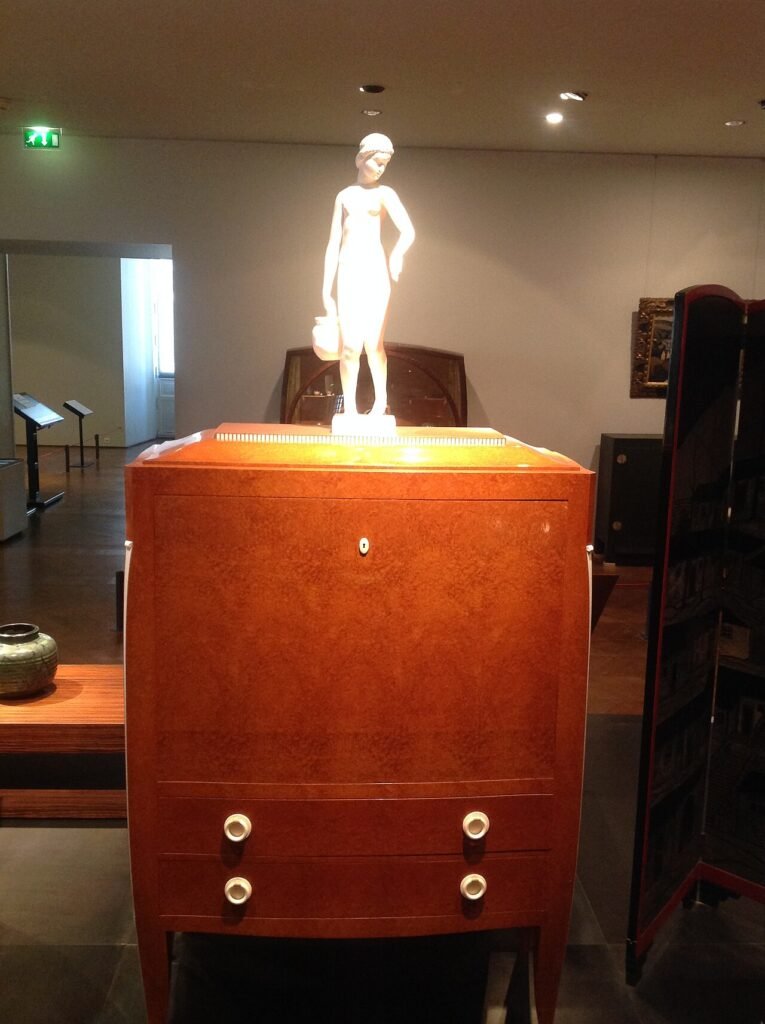 Art Deco cabinet and statue